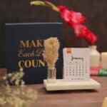 minimalist desk calendar 2026 with marble base and pampas grass