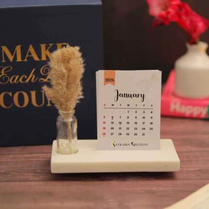 minimalist desk calendar 2026 with marble base and pampas grass