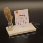 minimalist desk calendar 2026 with marble base and pampas grass
