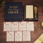 minimalist desk calendar 2026 with marble base and pampas grass