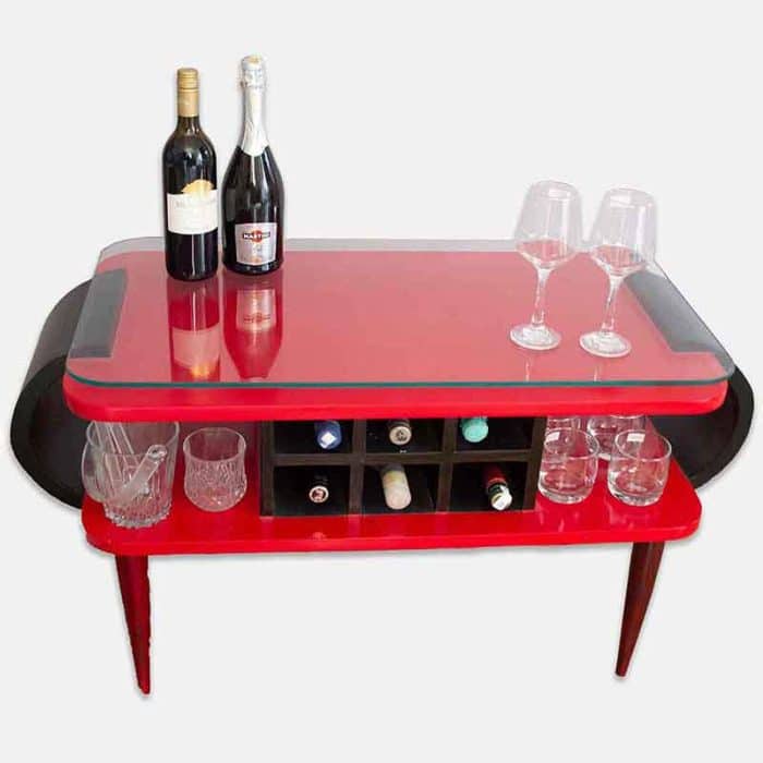 red and black bar table with glass top and sleek wood legs