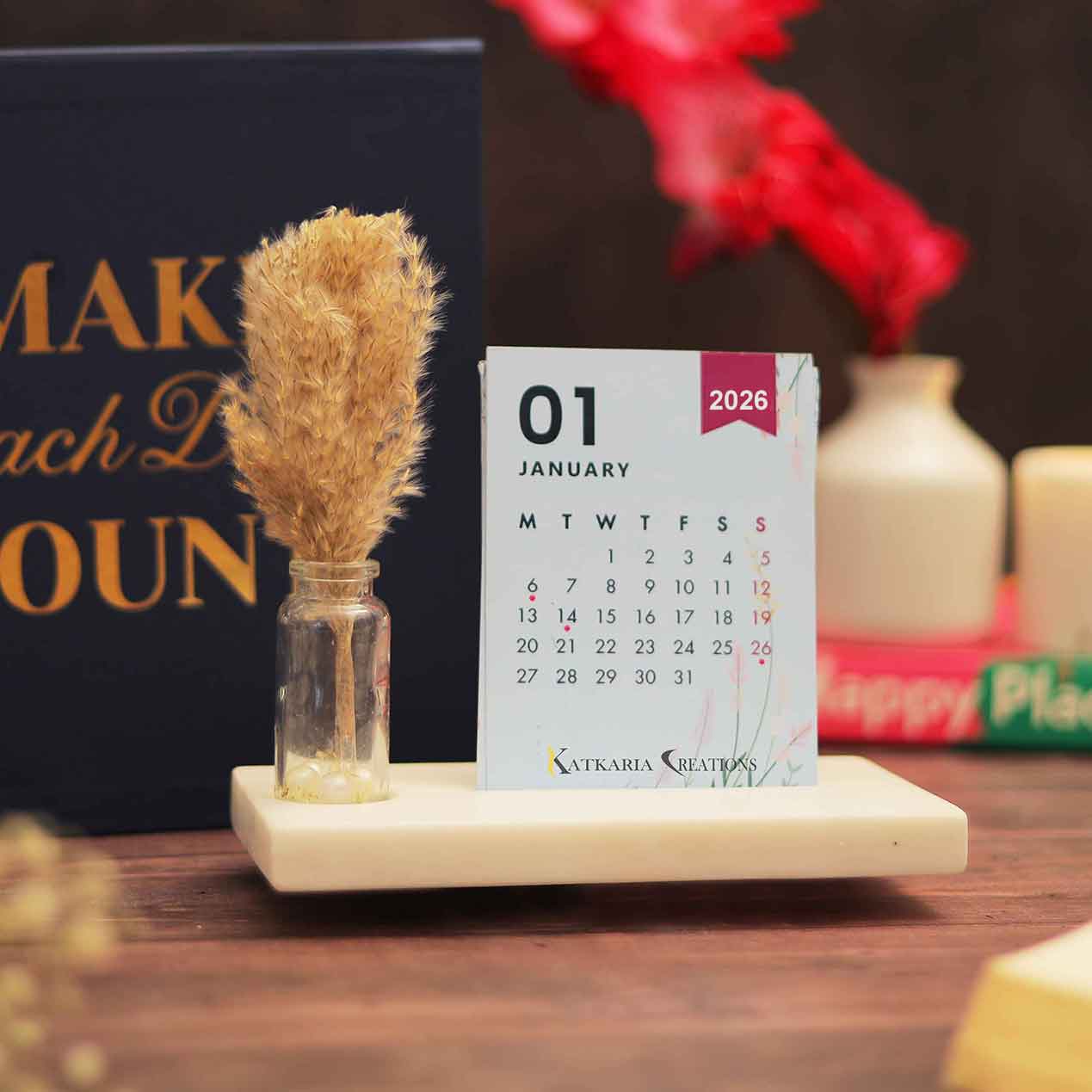 cute calendar 2026 cute desk calendar 2026 with vibrant colors on a marble base and pampas grass