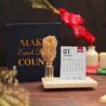 cute desk calendar 2026 with vibrant colors on a marble base and pampas grass