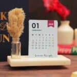 cute desk calendar 2026 with vibrant colors on a marble base and pampas grass