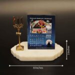 desk calendar 2026 with 12 jyotirlinga months with a brass trishool