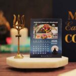 desk calendar 2026 with 12 jyotirlinga months with a brass trishool