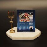 desk calendar 2026 with 12 jyotirlinga months with a brass trishool